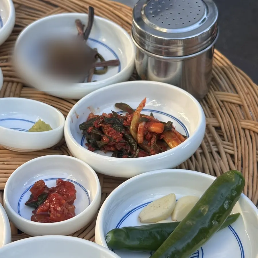 Plate of basic side dishes served with lettuce wraps