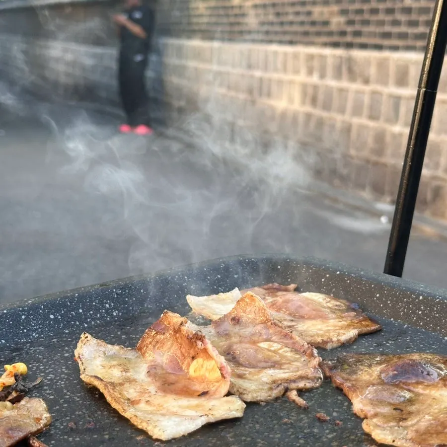 Close-up of thin-cut pork belly with attached cartilage