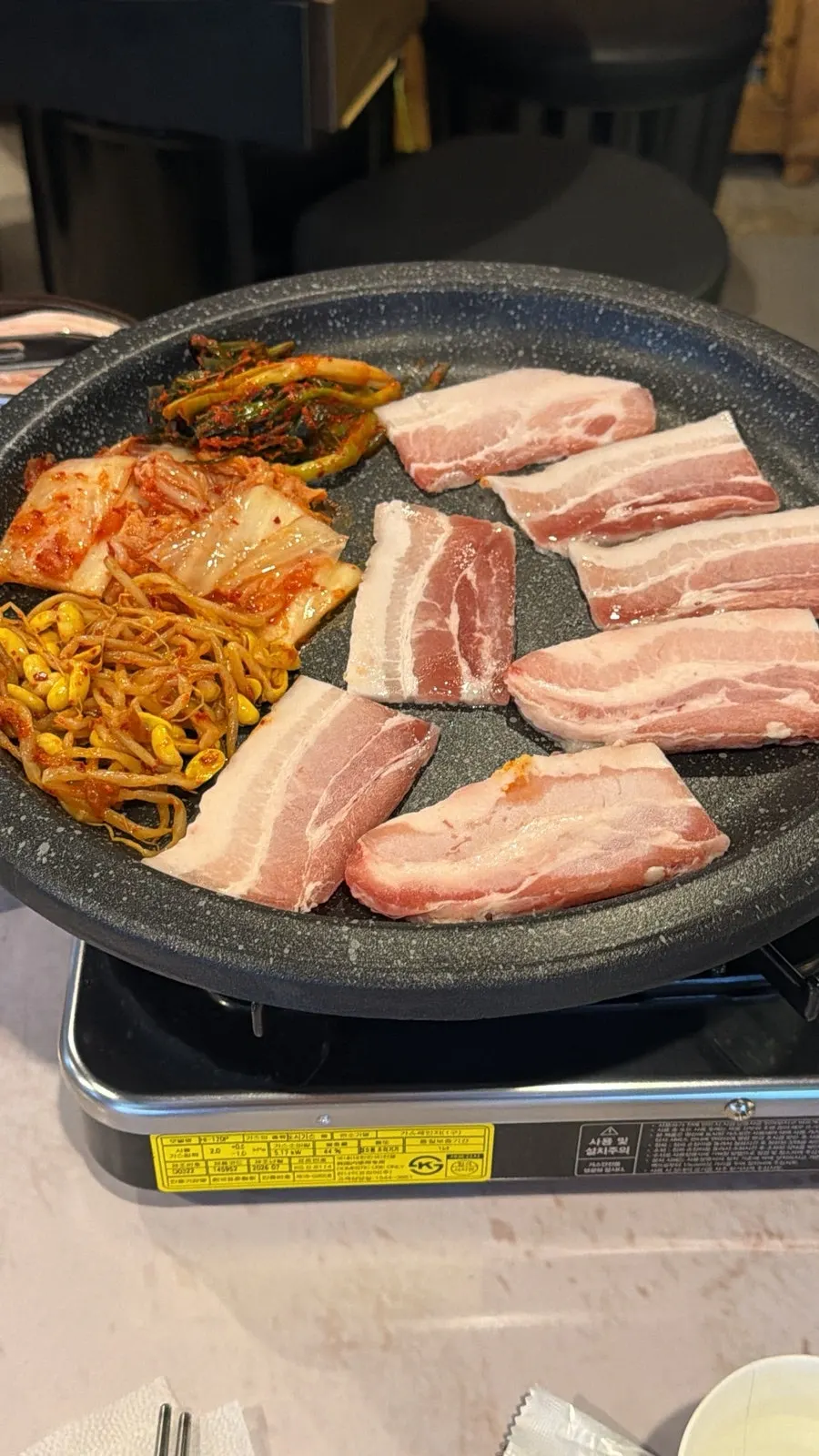 Thin frozen pork belly grilled to a golden brown