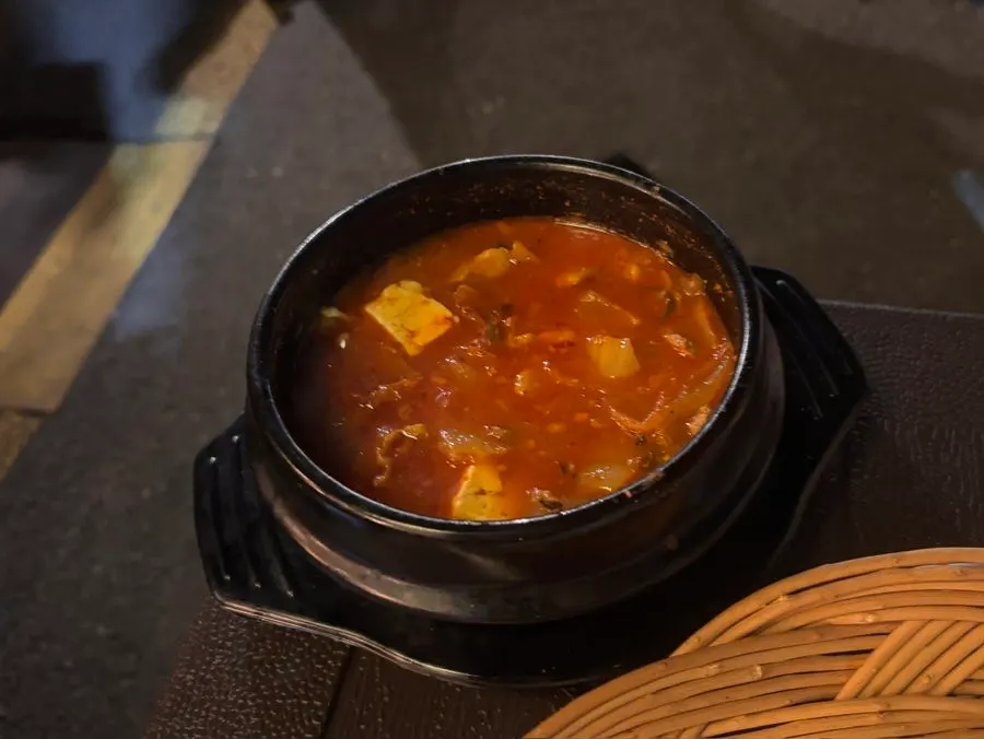 A pot of spicy pork kimchi stew