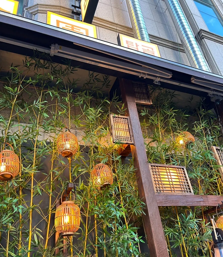 The entrance to Tapgol Gongwon Jongno 3-ga Branch decorated with bamboo and lantern lights