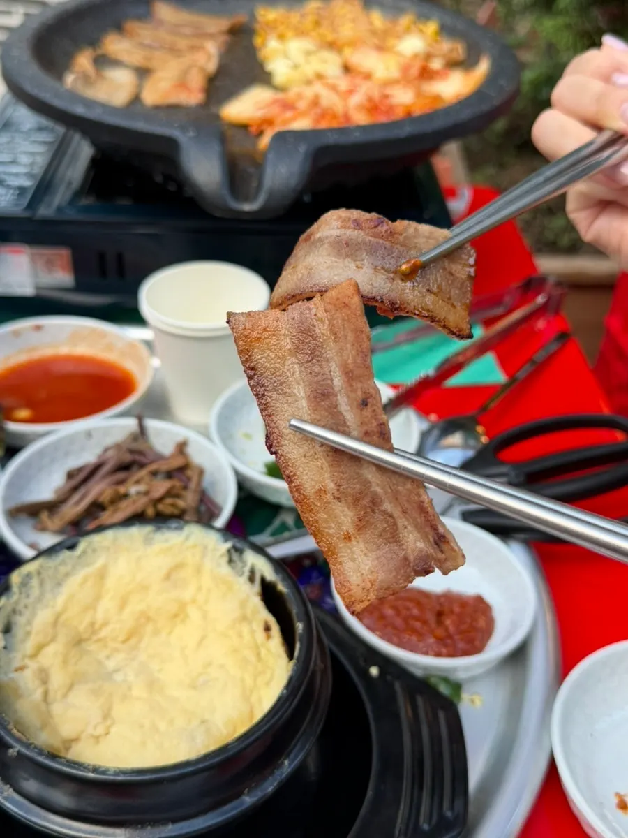 Fluffy steamed egg served alongside the meat