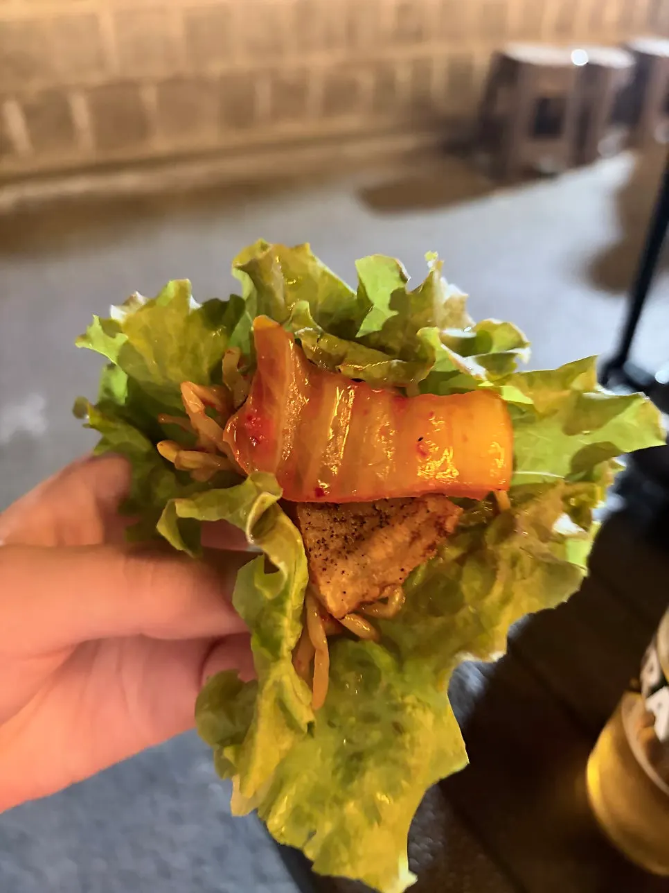 Grilled kimchi and frozen pork belly wrap