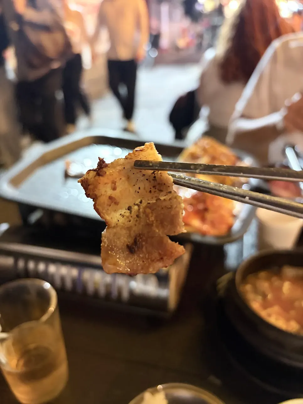 Outdoor meat meal in front of Tapgol Park