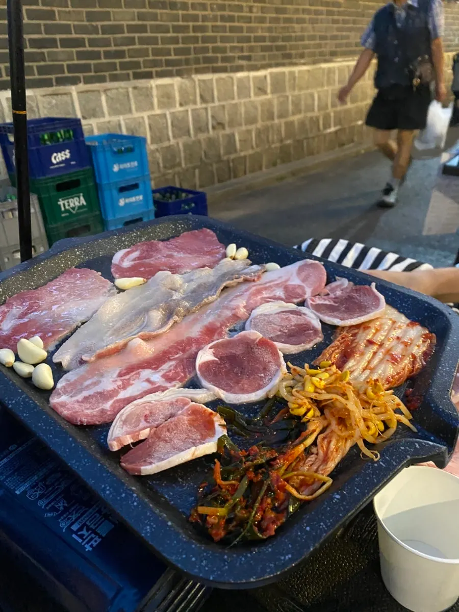 A platter of the Tapgol Set with flash-frozen pork belly and duck loin