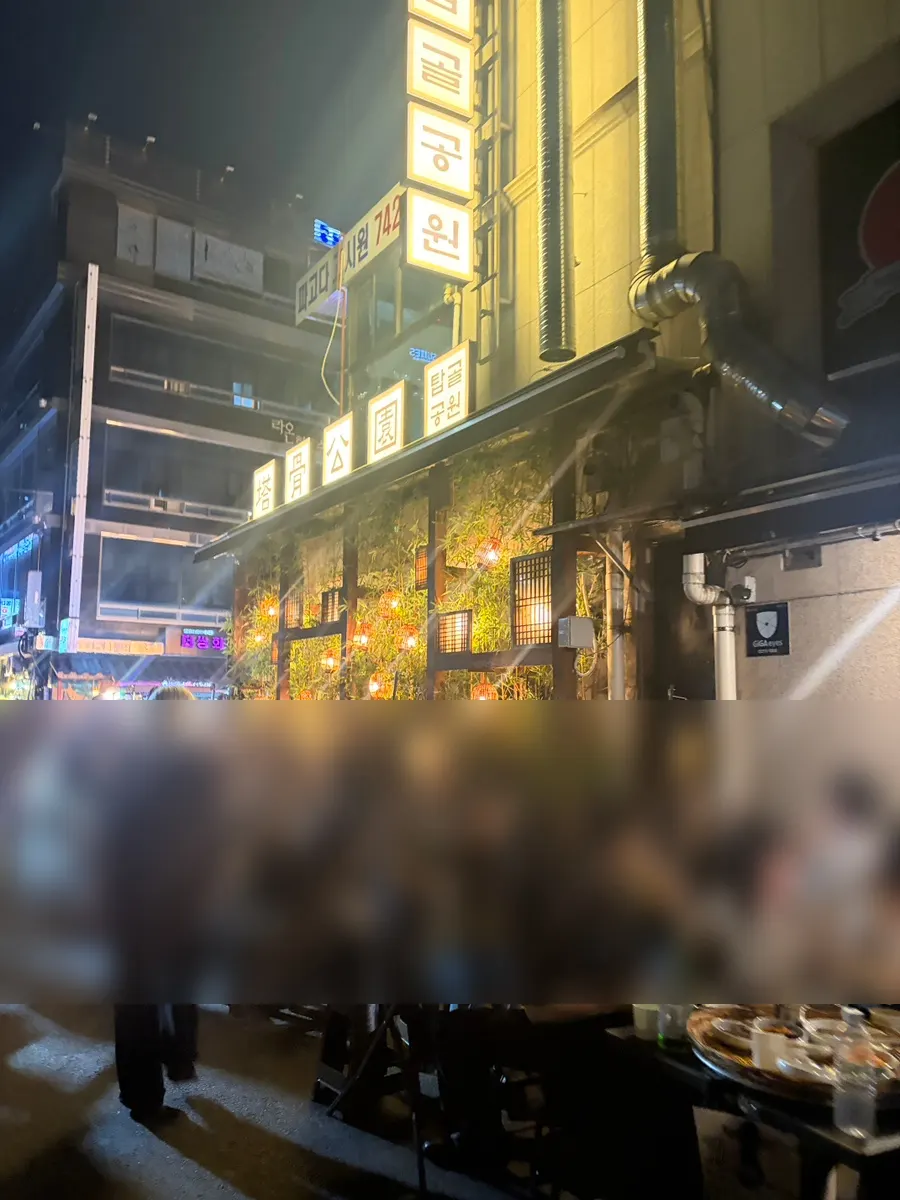 Nighttime atmosphere at the Tapgol Gongwon outdoor BBQ spot