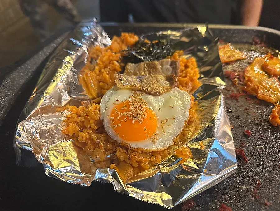 Steamed egg and rice served alongside the pork belly