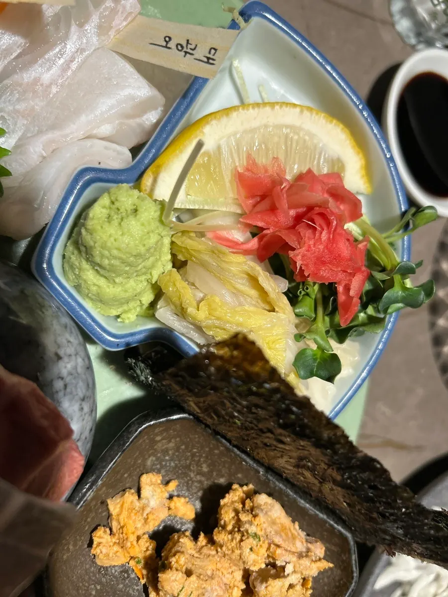 Aged sashimi assortment of flounder, salmon, and red sea bream