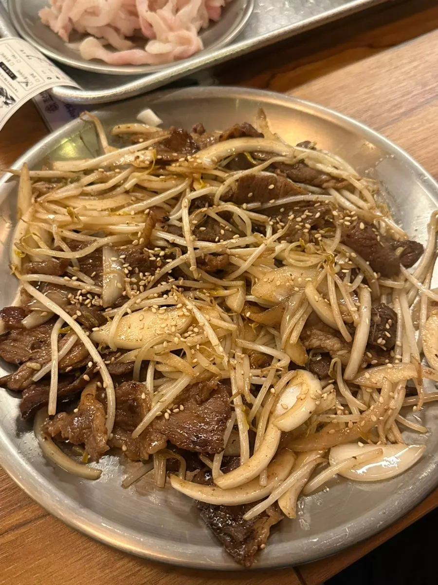 Makhoe with a glass of soju