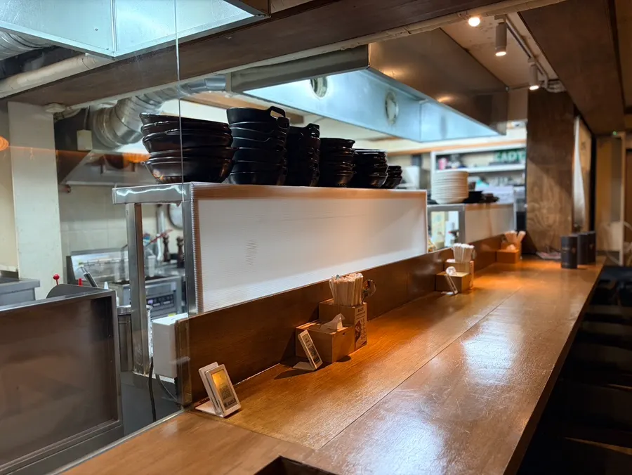 Dachi counter seats at Joseonmakhae facing the kitchen