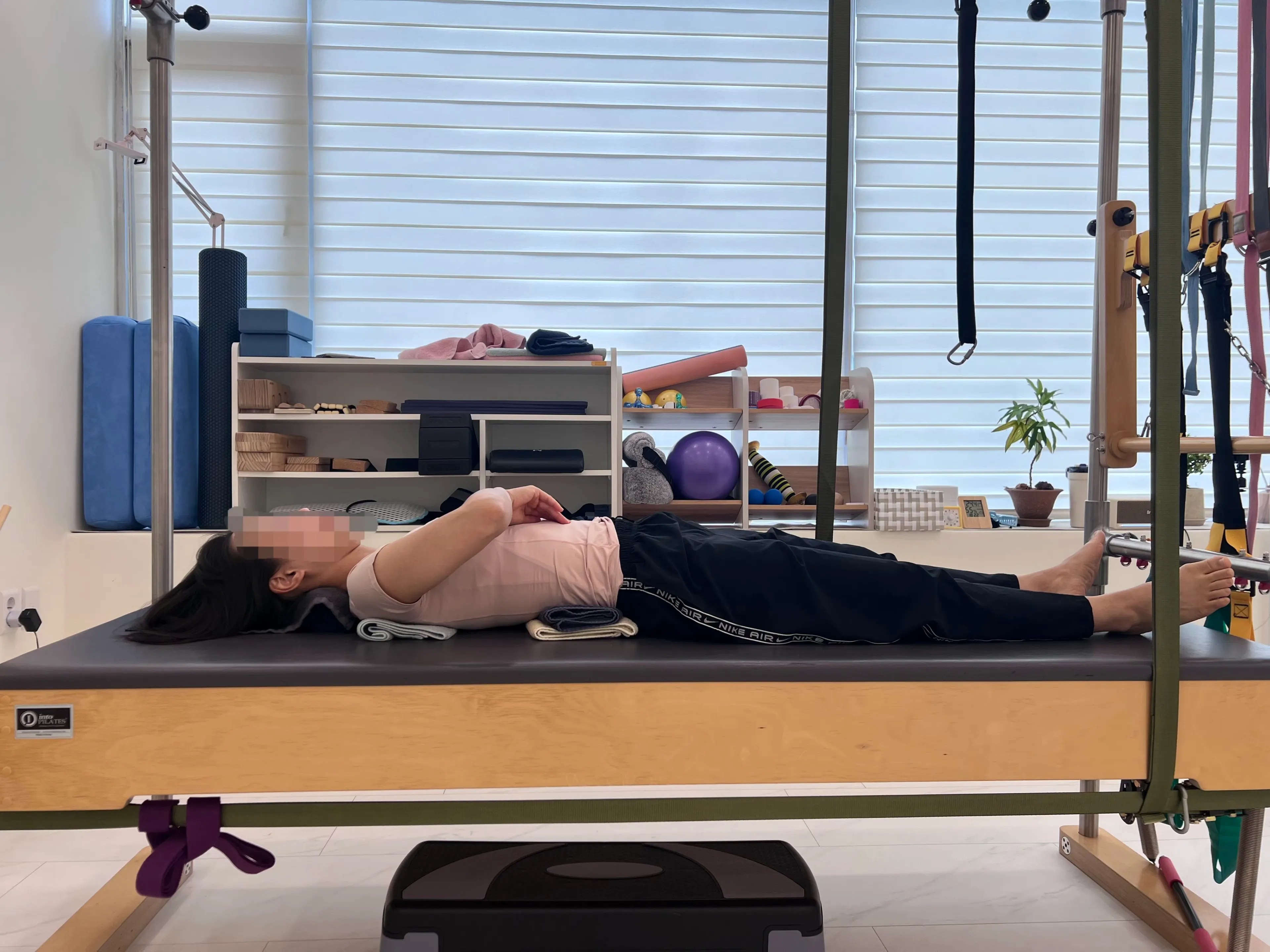 Practicing breathing method while lying on the bed