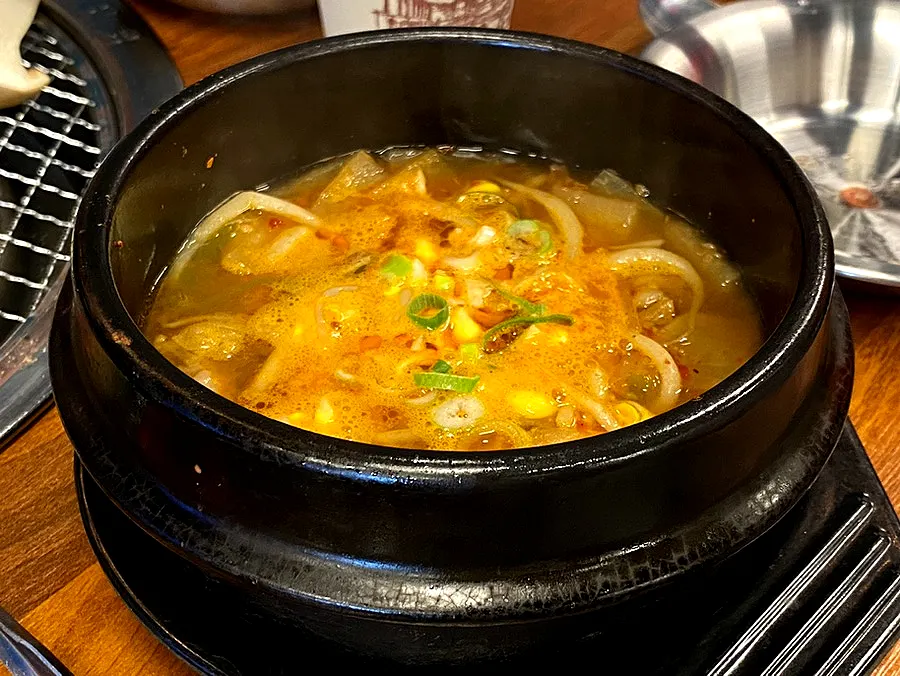 The full spread of meat and side dishes