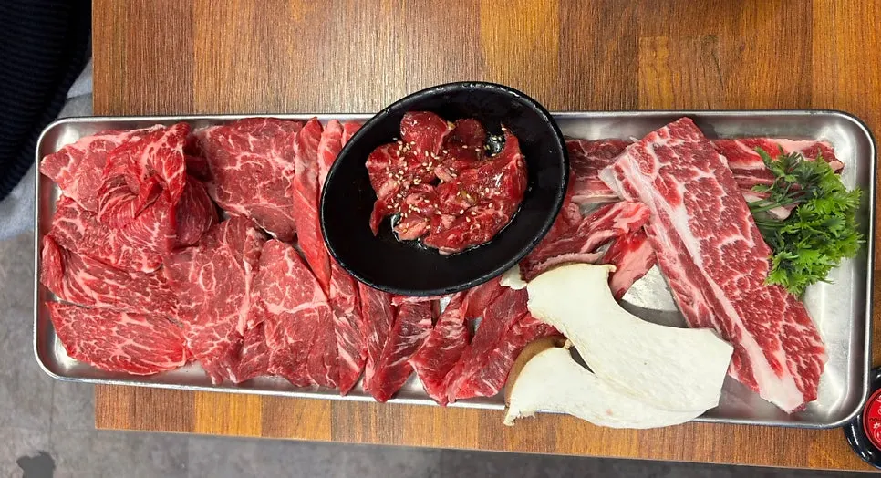 Beef sushi made by placing grilled beef on sushi rice