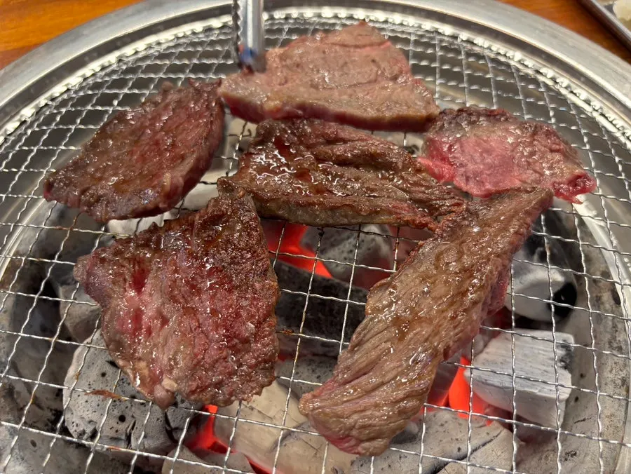 Warm soup served alongside the meat