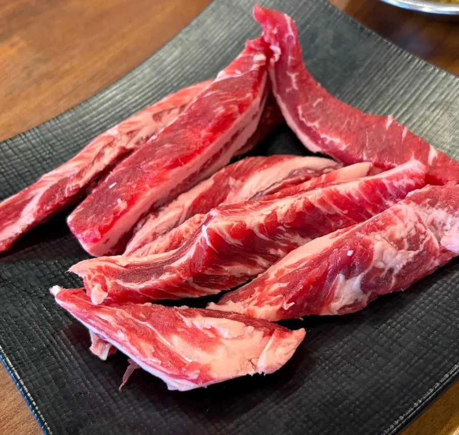 Fresh beef rib meat and flower cut on the charcoal grill