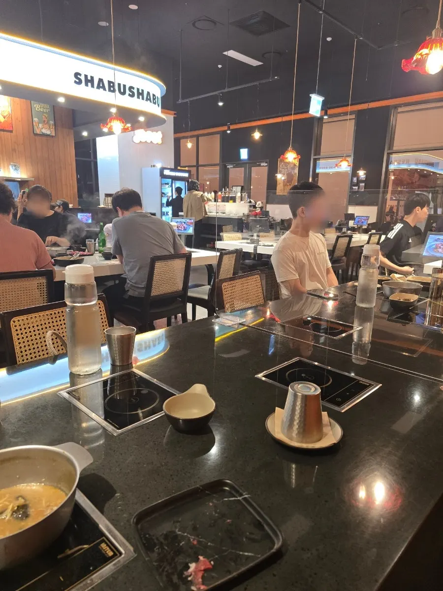 Table at J's Pot Magok Branch with built-in induction stove