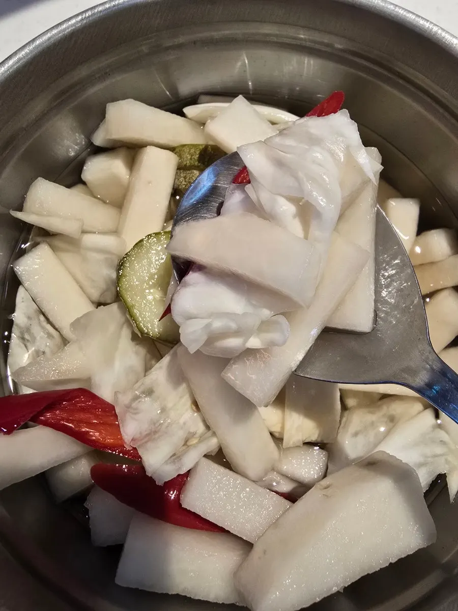 Pot with remaining hot pot broth and ingredients