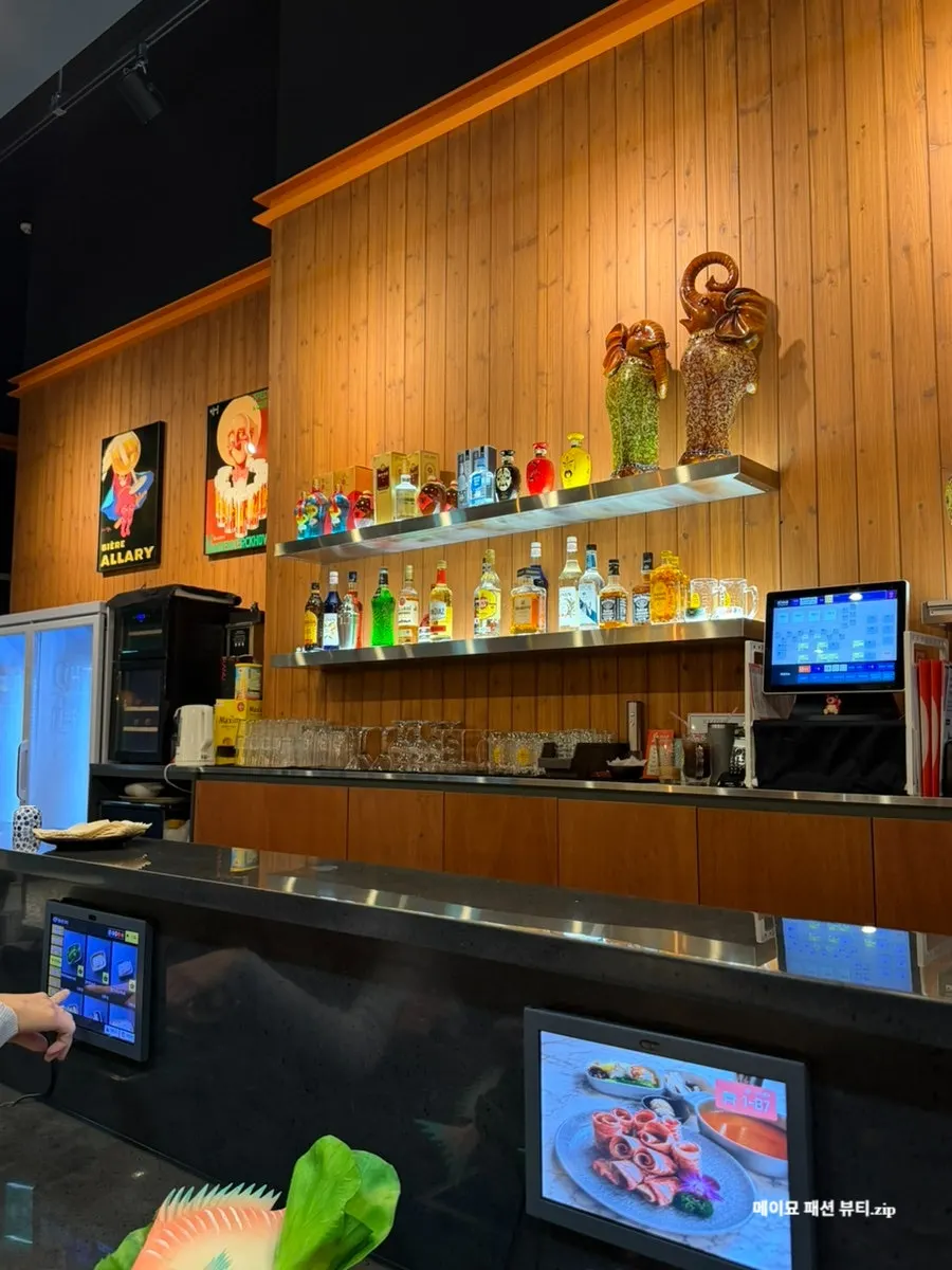 Restaurant view with table seating and bar table