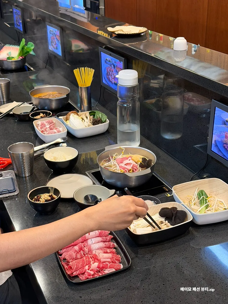 Bar table seat with individual induction cooktop