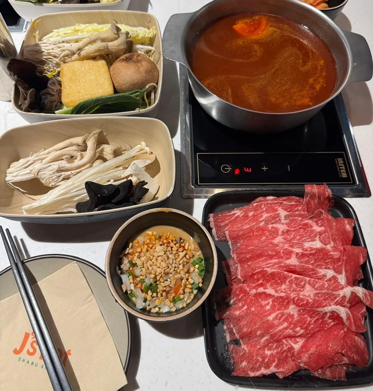 Full spread of the signature hot pot set at J's Pot Magok Branch