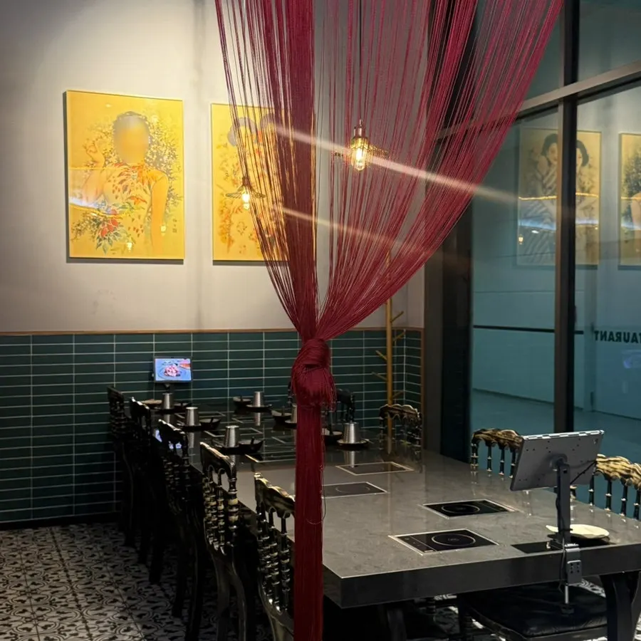 Interior with a variety of tables for different party sizes