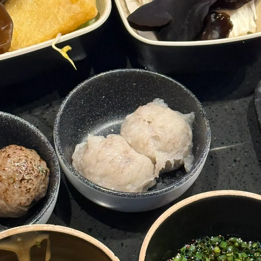 Beef added into the hot pot