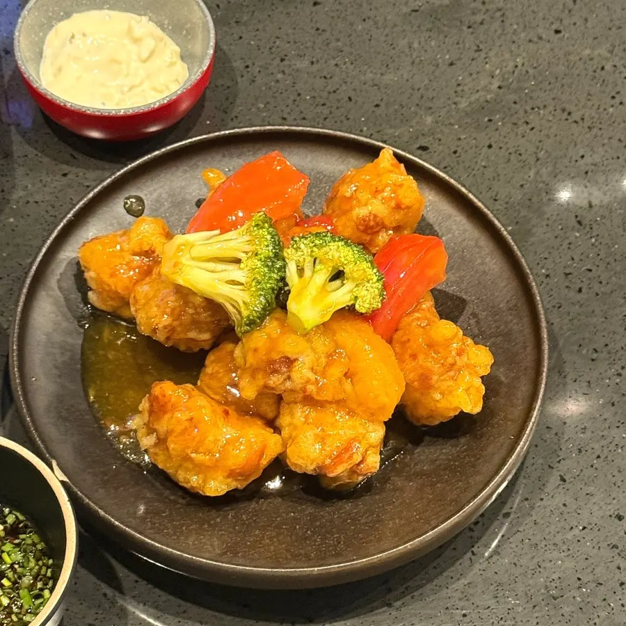 A plate of tangy orange chicken