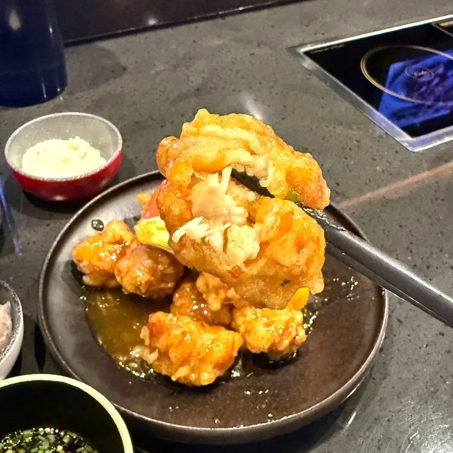 Close-up of a piece of fried orange chicken