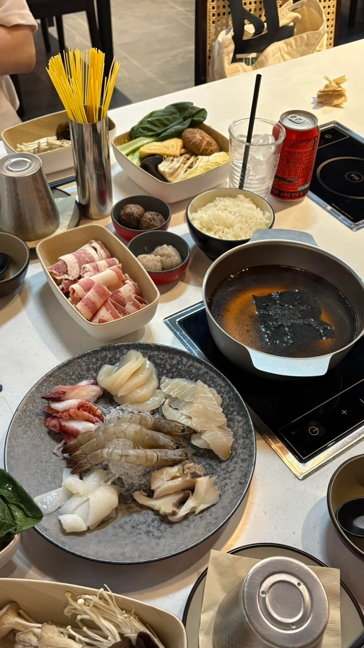 Personal hot pot table set up with both sauces
