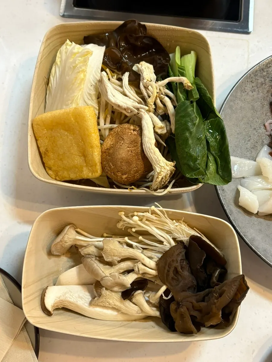 Lightly cooked thin beef slices with vegetables