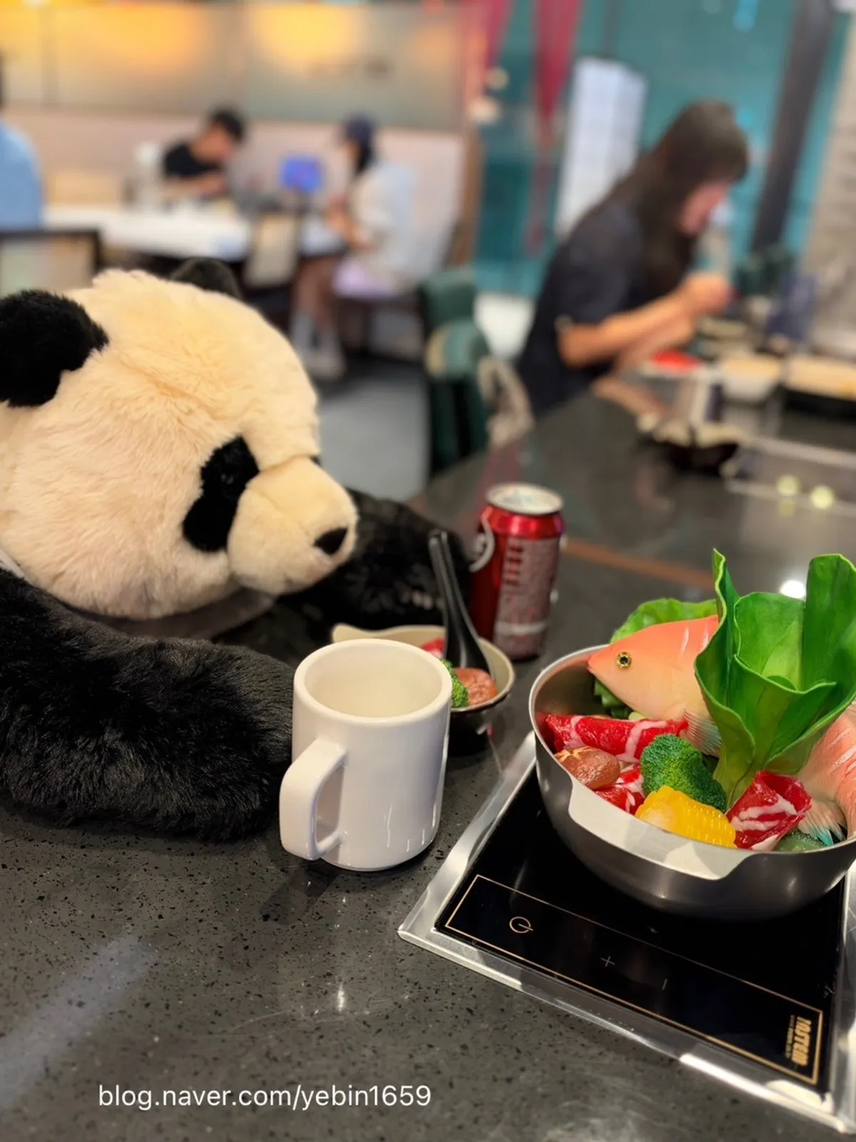 A full spread of solo-pot shabu-shabu at J's Pot Magok Branch