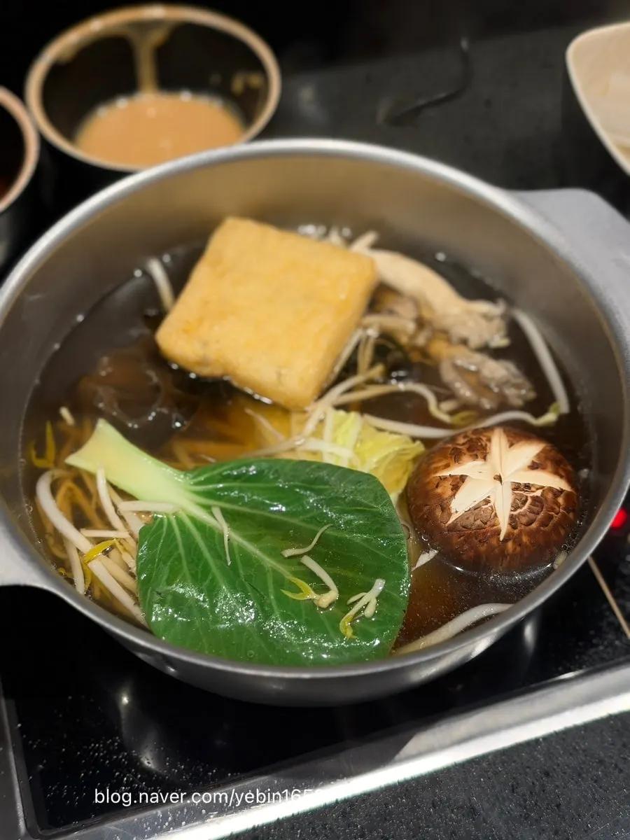 Added bean sprouts lightly cooked in the broth