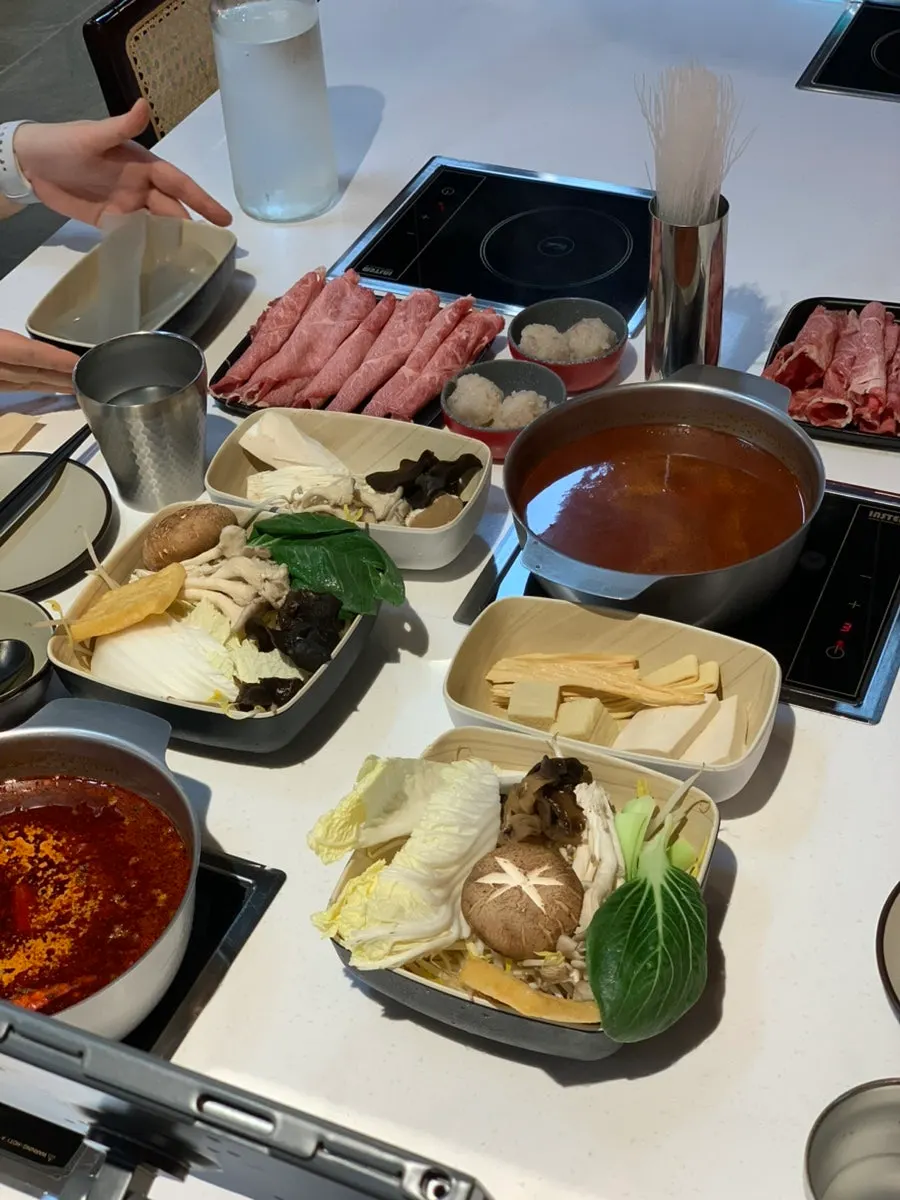 Generously plated hot pot beef set spread