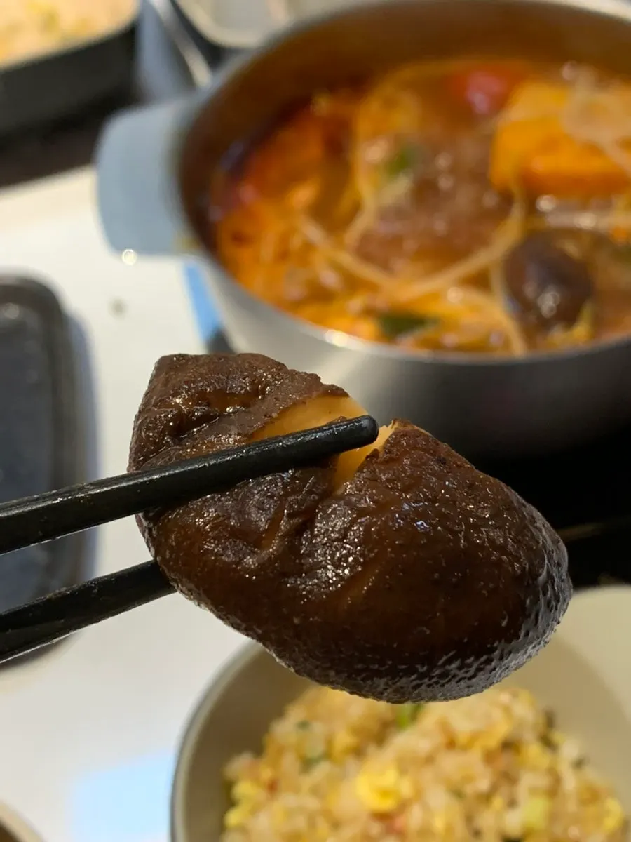 Tofu and mushrooms soaked in tomato broth