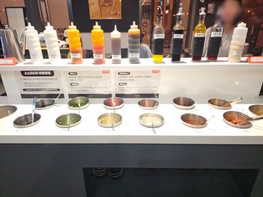 Large sauce bar in the center of the restaurant