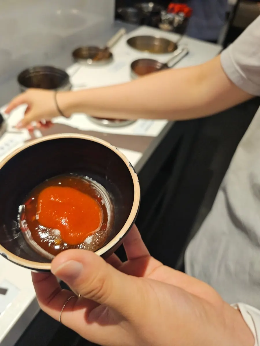 Friend mixing her own sauce