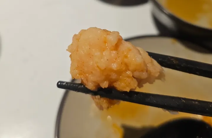 Shrimp balls cooked in the tomato hot pot
