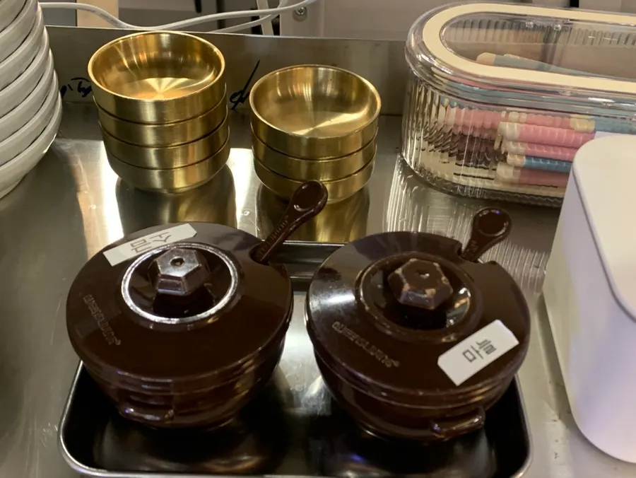 Seasonings and side dishes at the self-serve station
