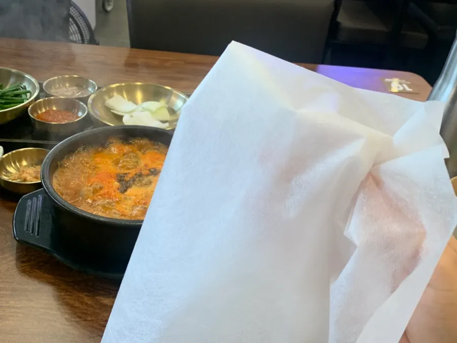 Table set with gukbap and a plate of suyuk