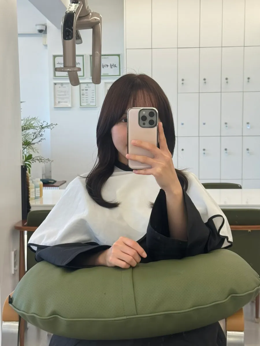 Hairstyle finished with an S-curl blow-dry