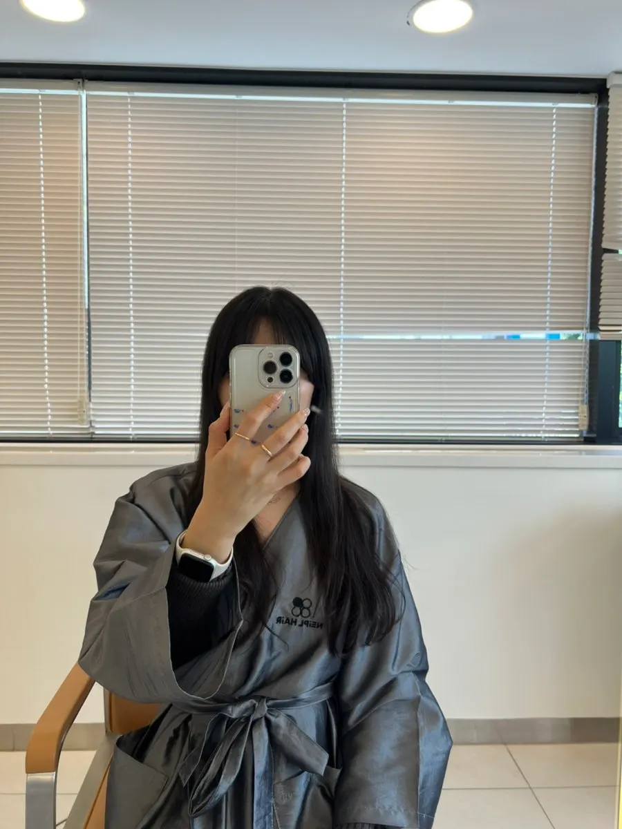 Long hair before treatment with curl left only at the ends