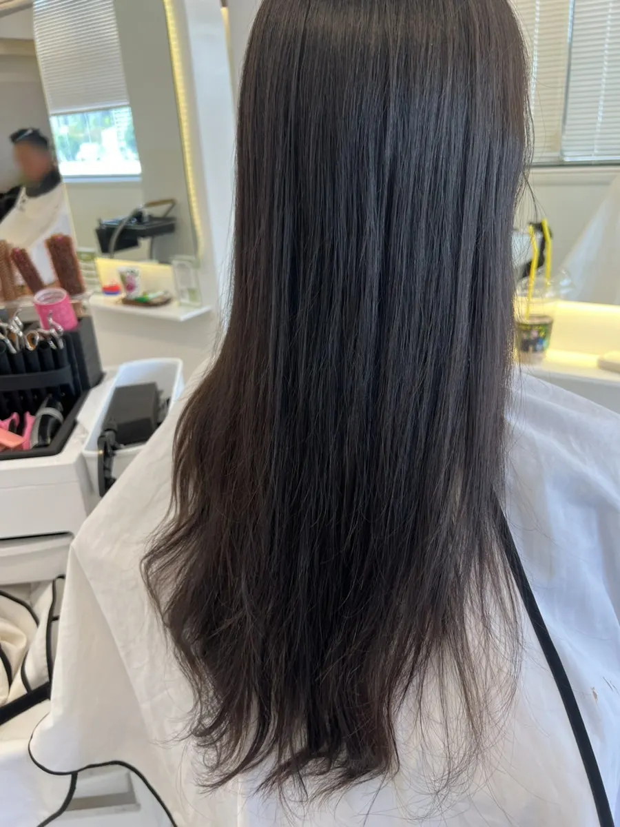 Split ends visible before the hippie perm