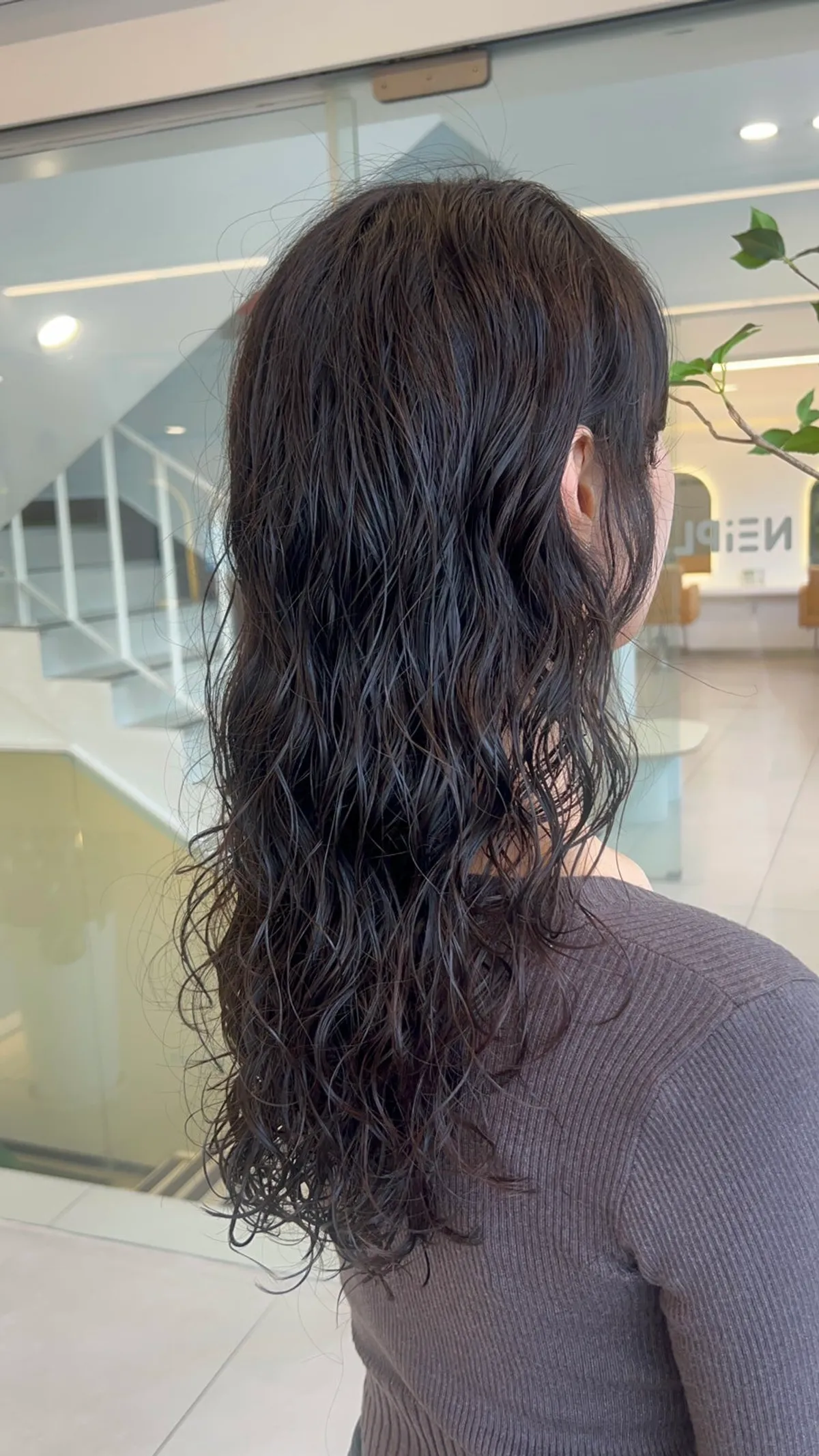 Long hair after the thick hippie perm is finished