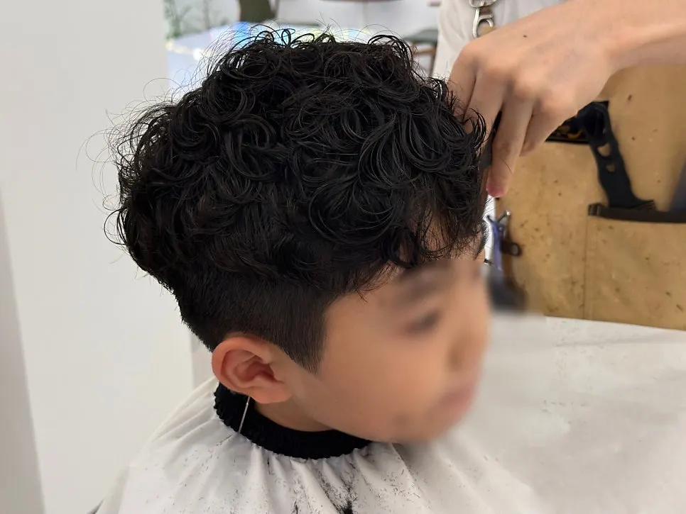 The finished, springy kids' shadow perm