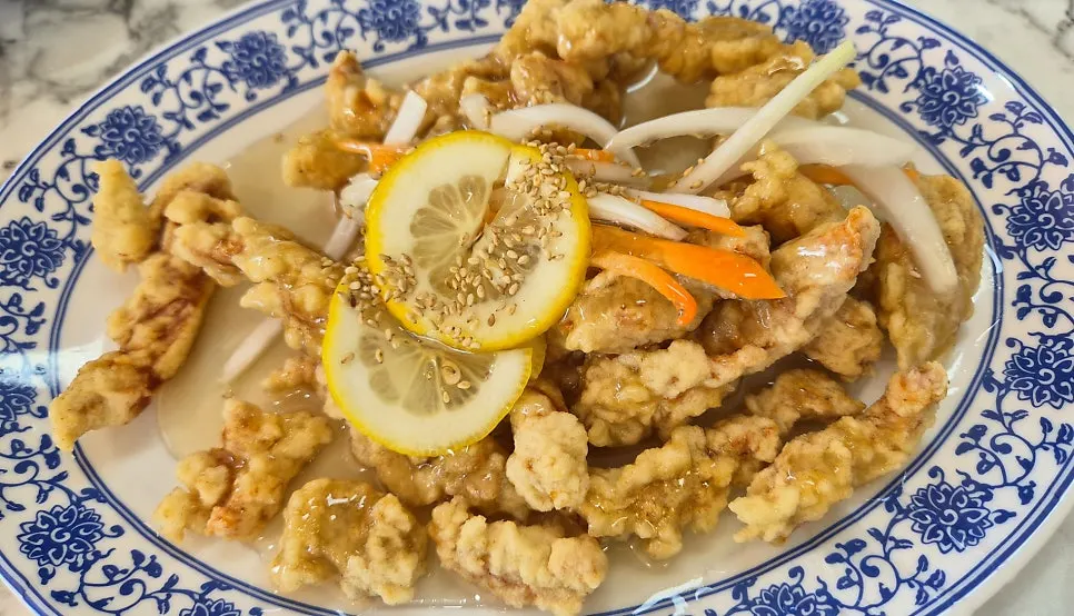 Lemon tangsuyuk served in a blue bowl
