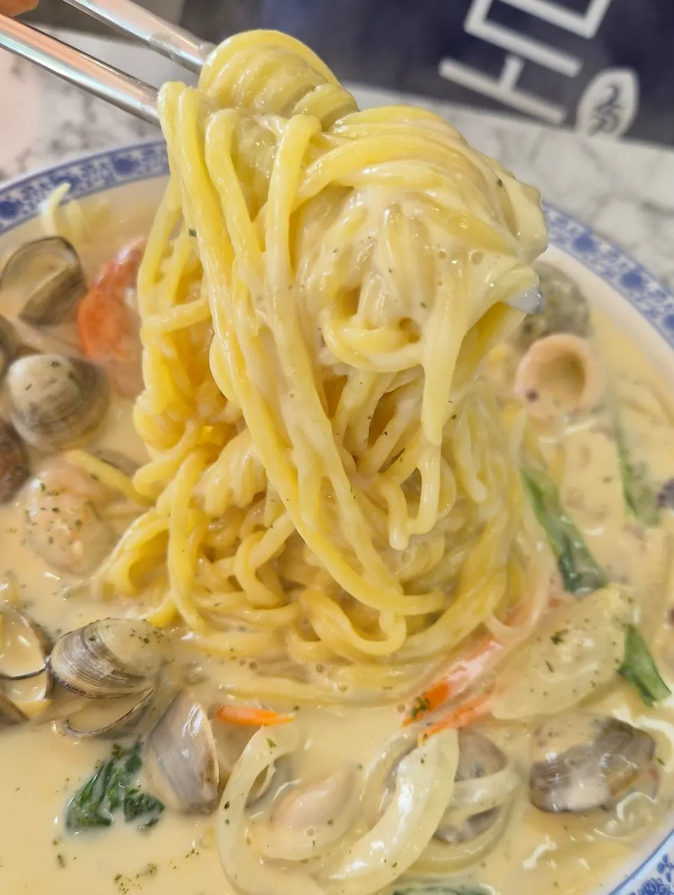 Close-up of seafood in cream jjamppong