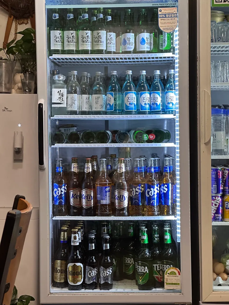 Fridge stocked with alcoholic drinks
