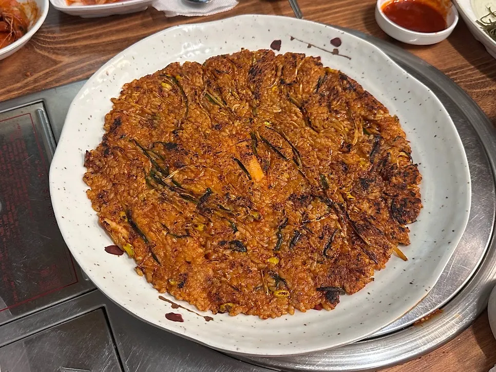Fried rice pressed and fried like a pancake