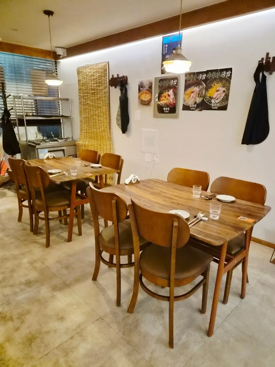 Seating at Jumak Inho with wood interior and warm lighting