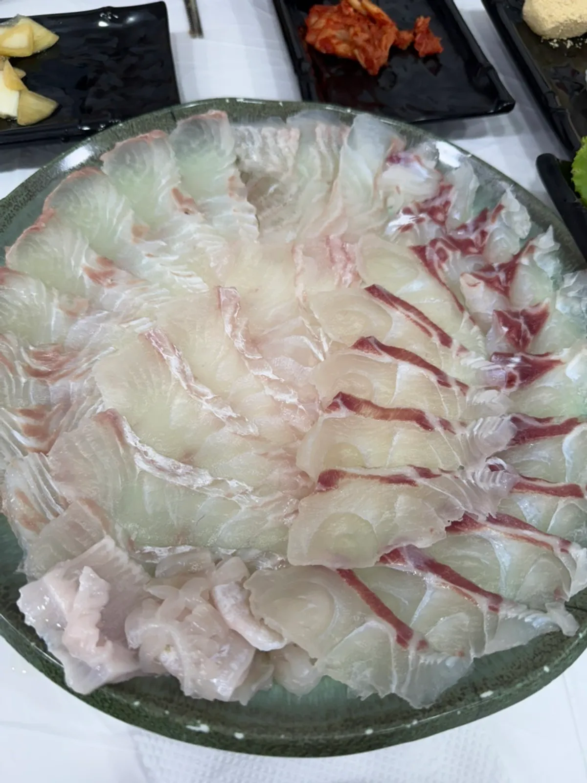 Small plate of flounder and sea bream sashimi